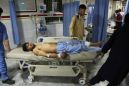 The Latest: Witness says children killed in Kabul blast
