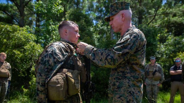 a corporal gave a speech in front of the top marine and got promoted