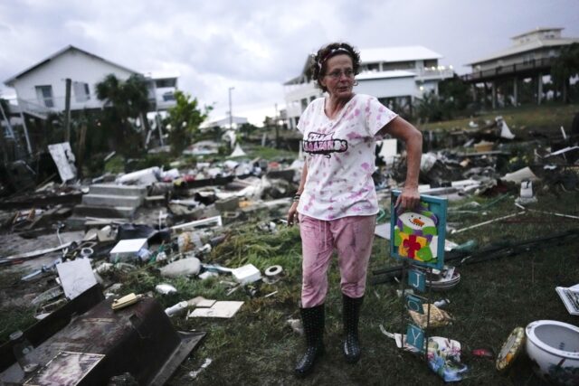 a woman was cleaning up after hurricane idalia then a hungry sea creature showed up