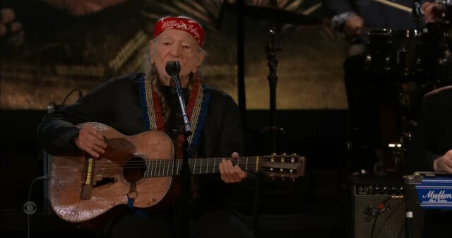 watch willie nelson perform i never cared for you with all star supergroup on colbert