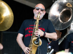 Ben Ellman on sax at Midnite Disturbers show during Jazz Fest 2024 scaled 1