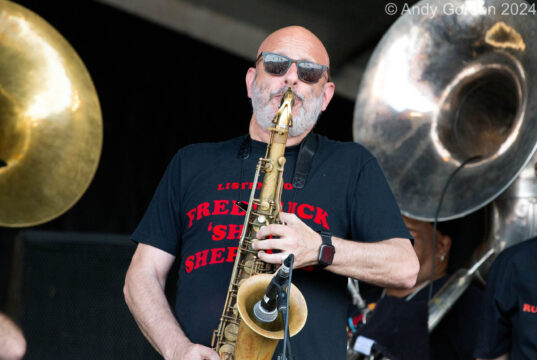 Ben Ellman on sax at Midnite Disturbers show during Jazz Fest 2024 scaled 1